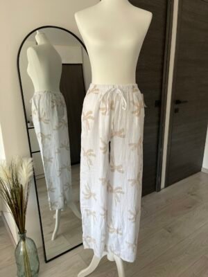 Pantalon blanc en gaze de coton motif palmiers beige